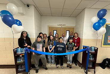 Students, staff and administrators gathered for the grand opening of the Wisdom Lane Middle School library on Feb. 14.