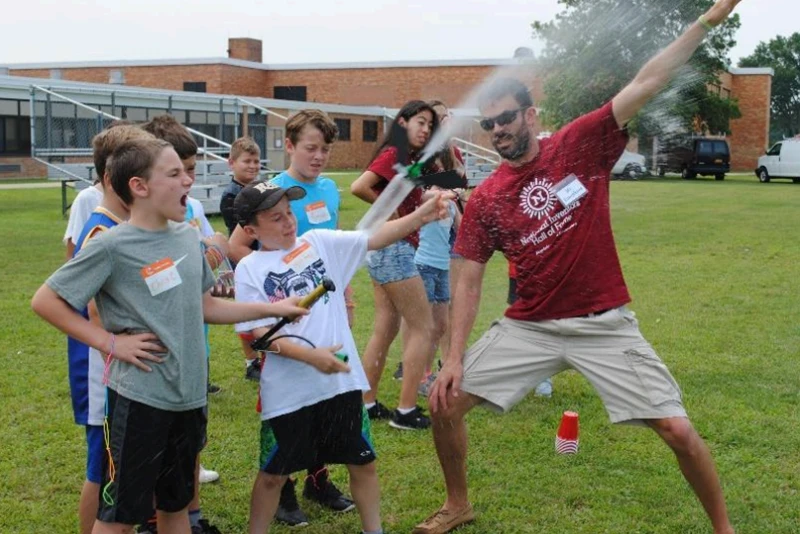 Teacher with students at Camp Invention