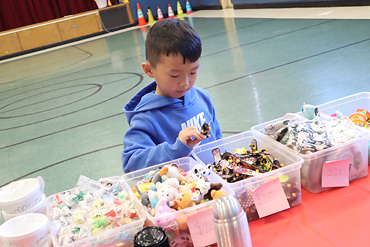 Gardiners Avenue Elementary School students browsed the interesting items available at the Mustang Market on Nov. 8.