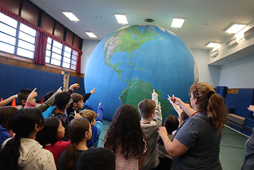 Students at Gardiners Avenue Elementary School in the Levittown Public School District saw the world from a different perspective on Jan. 11 as they experienced every corner of the globe presented in giant-sized fashion.