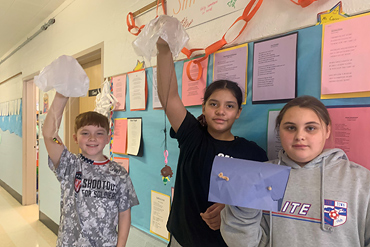 The fifth-grade students in Ms. Corron's class applied what they learned about gravity from the Science Dimensions unit titled, "Systems in Space", to create models of parachutes.