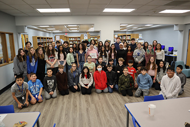 Eighth graders in the honors program at Wisdom Lane Middle School in the Levittown School District recently became authors after publishing an original book.