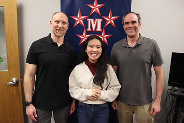 General Douglas MacArthur High School junior Melody Hong won first place in the prestigious Long Island Brain Bee. She was joined by her science teachers Mr. Zausin, left, and Dr. Friedman, right.