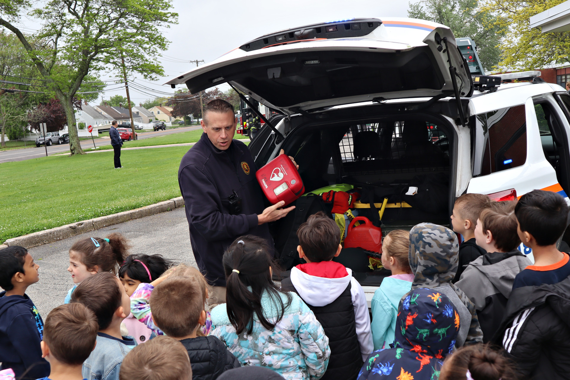Nassau County Police Department officers showed students equipment.