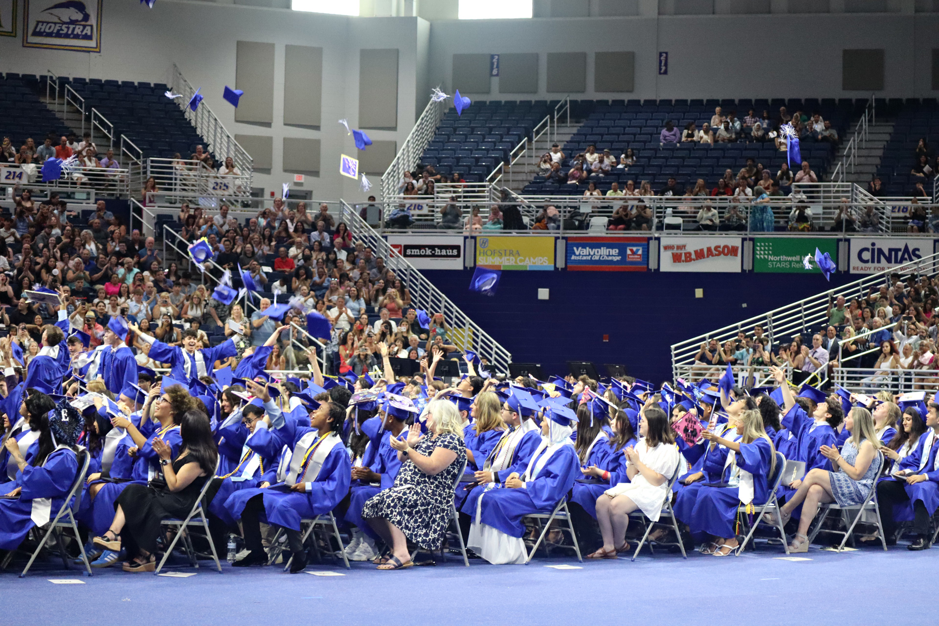 The Class of 2024 threw their caps into the air upon being named graduates.
