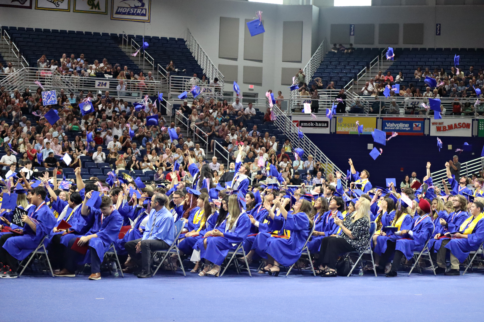 As is tradition, seniors tossed their caps into the air after being named graduates.