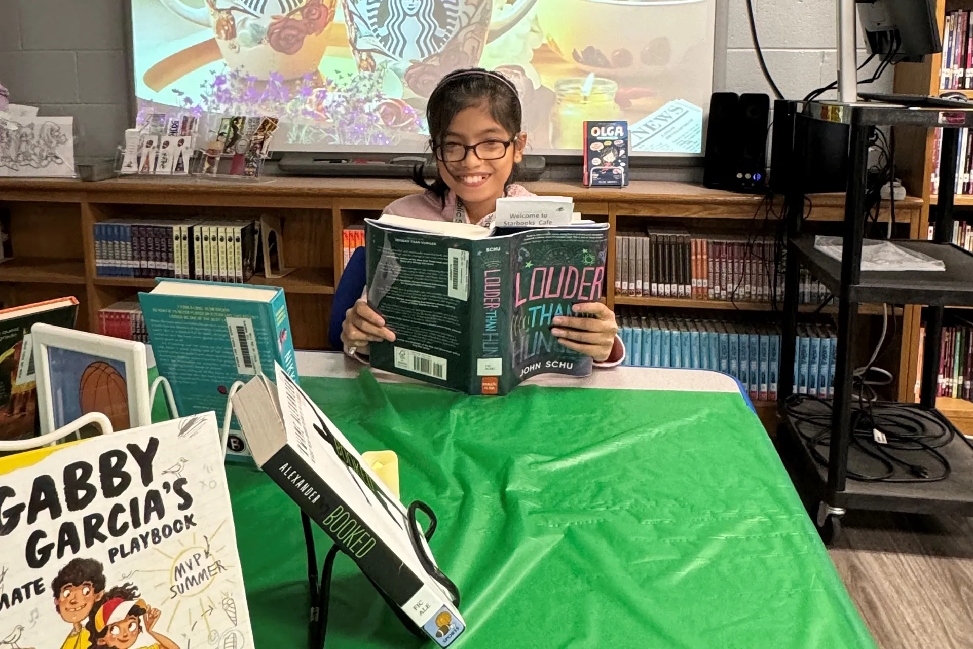 Sheika Musfera enjoyed her new read accompanied by relaxing background music.