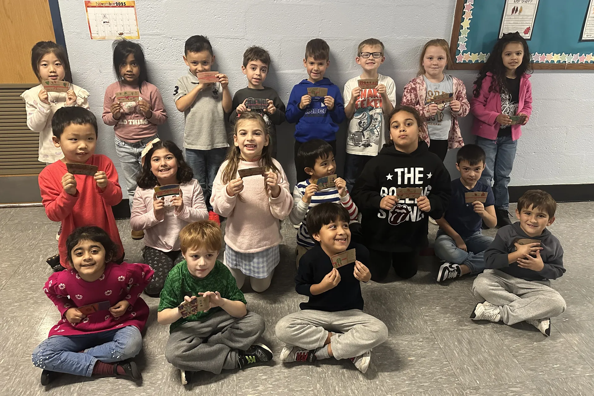 Summit Lane First Graders Celebrate World Kindness Day By Decorating Starbucks Coffe Sleeves - image002
