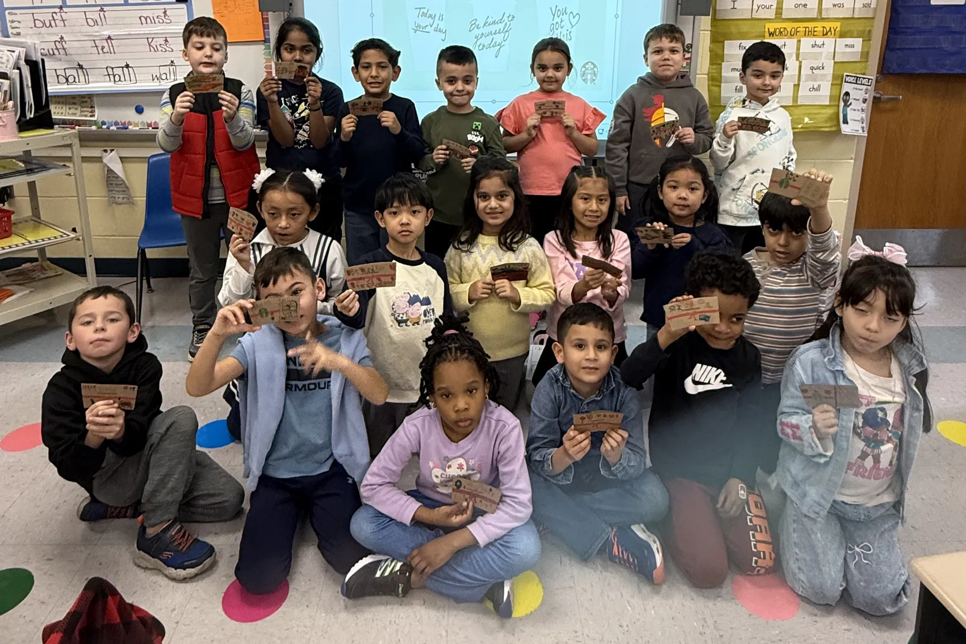 Summit Lane First Graders Celebrate World Kindness Day By Decorating Starbucks Coffe Sleeves - image003