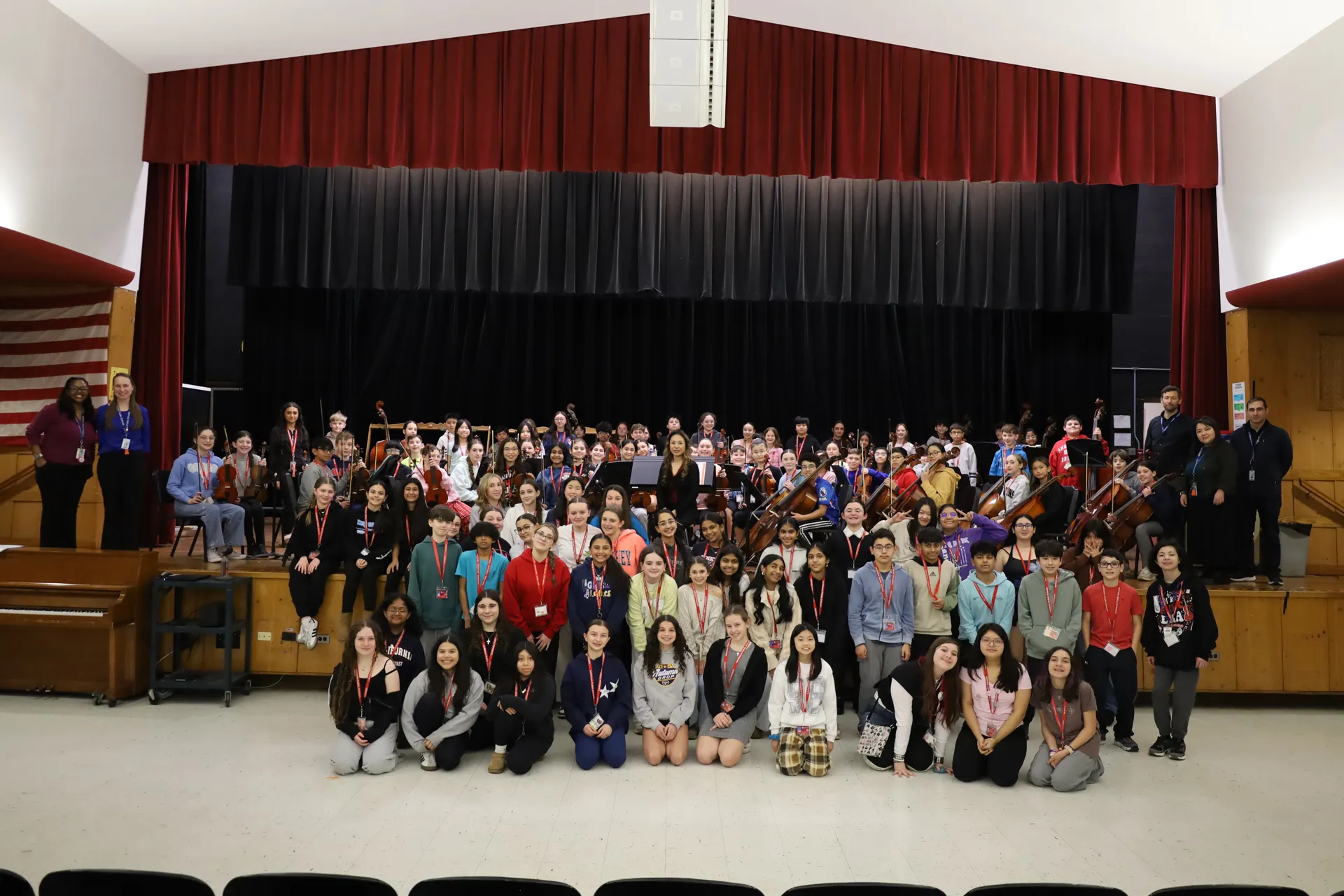 Mrs. Newbold, center, was joined by sixth, seventh and eighth grade performers, as well as the school's music teachers.