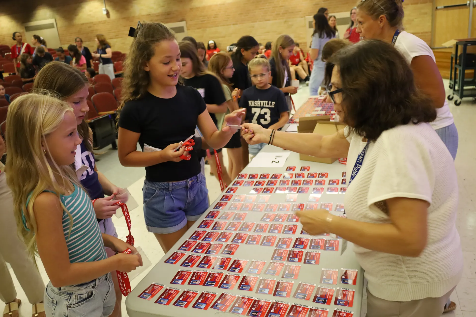 Sixth graders received their new middle schools IDs during the Jonas E. Salk Middle School orientation on Aug. 25 and 26.
